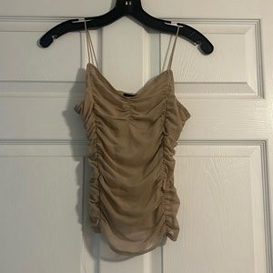 Beautiful spaghetti strap shirt.